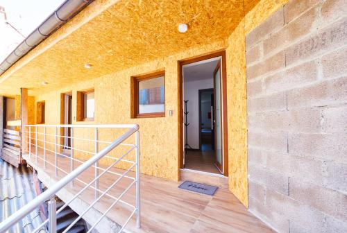 a building with a staircase leading to a door at TH 103 Appartement F2 à Thann 1 à 3 personnes in Thann