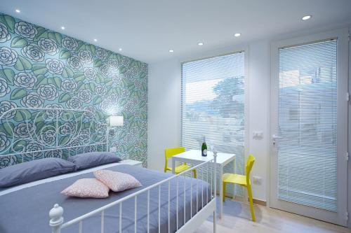 Ένα ή περισσότερα κρεβάτια σε δωμάτιο στο SalDimora