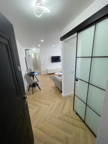 Televisyen dan/atau pusat hiburan di APARTAMENT ULTRACENTRAL,PARCARE PRIVATA,WiFi
