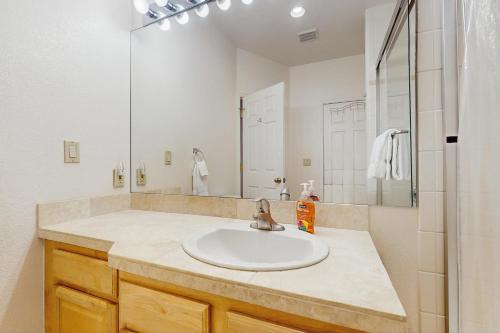 a bathroom with a sink and a mirror at Mountain Retreat in Basalt