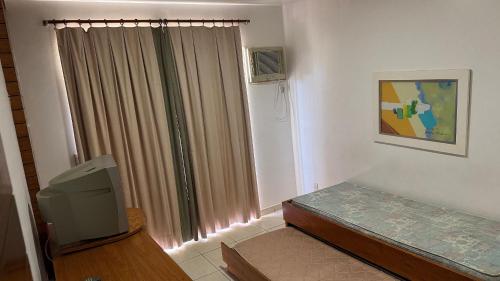 Кровать или кровати в номере Náutico Flat Service