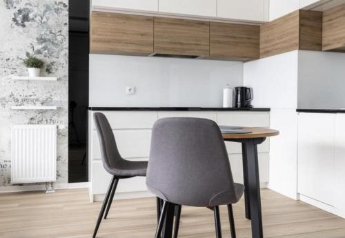 Dapur atau dapur kecil di Sweda Apartments Gdańsk Seaside