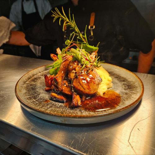 a plate of food sitting on a table at Hotel Nineteen in Barnsley