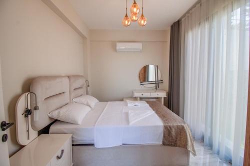 En eller flere senge i et værelse på Angel Houses 3