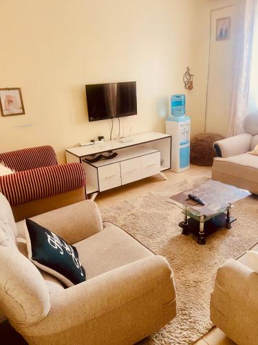 TV a/nebo společenská místnost v ubytování Nova suite