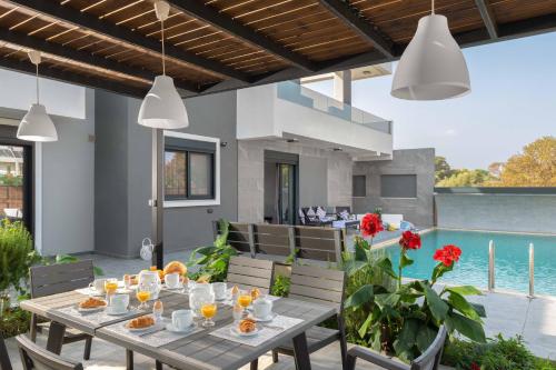 Πισίνα στο ή κοντά στο Harmony Villas Rhodes