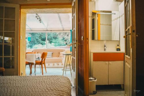 a room with a kitchen and a dining room at La Calanque de Figuerolles in La Ciotat
