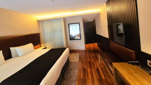 Postel nebo postele na pokoji v ubytování Fierro Hotel Buenos Aires