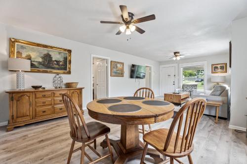 a dining room with a table and chairs at 3BR Home 4 mins St Anthony, Sleeps 6 #14A in Oklahoma City