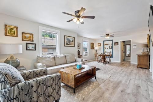a living room with a couch and a table at 3BR Home 4 mins St Anthony, Sleeps 6 #14A in Oklahoma City