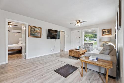 a living room with a couch and a table at Affordable 3br Vintage Home Near Paseo #14a in Oklahoma City