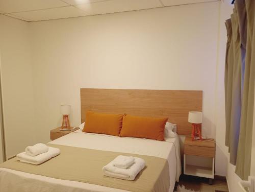Katil atau katil-katil dalam bilik di Apart Hotel Concepcion
