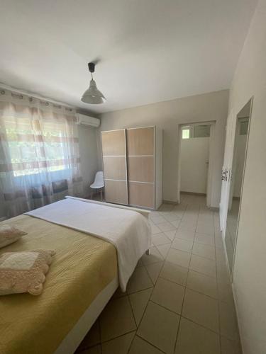 Postel nebo postele na pokoji v ubytování Le gîte du pré en Avignon