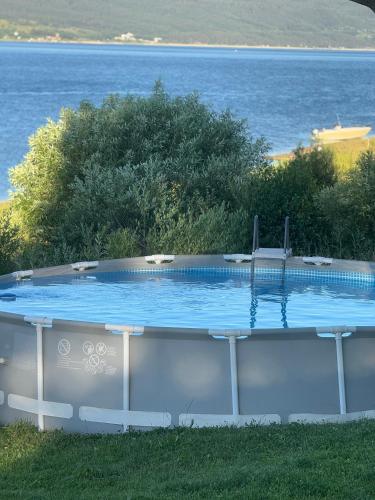 a swimming pool with a view of the water at VIP Complex in Sarnitsa