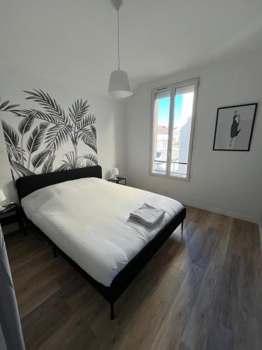 Postel nebo postele na pokoji v ubytování Vilnius - Confort familial