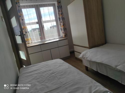 Zdjęcie z galerii obiektu Bursztynowe Zacisze Domek 1 Chłopy ul Turystyczna 6 w Chłopach