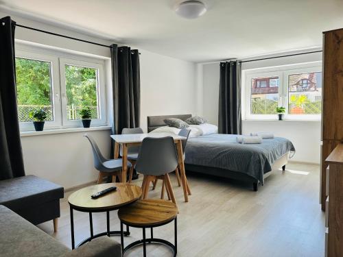 Ένα ή περισσότερα κρεβάτια σε δωμάτιο στο Anemos