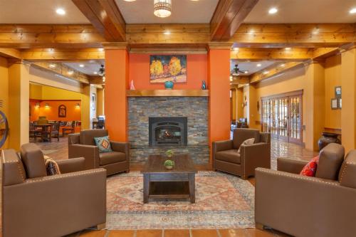 a lobby with couches and a fireplace at Hilton Vacation Club Villas de Santa Fe in Santa Fe