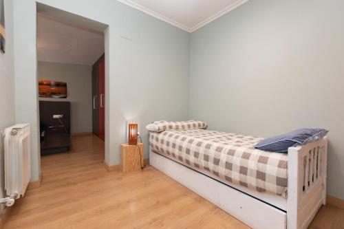 Katil atau katil-katil dalam bilik di Casa gratal en sietamo huesca