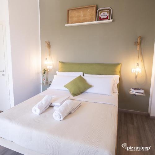 Cama o camas de una habitación en PizzaSleep B&B