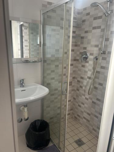 a bathroom with a shower and a sink at Hotel Abamar in Rimini