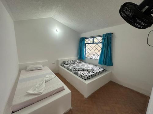 Postel nebo postele na pokoji v ubytování Finca Hotel Bella Vista
