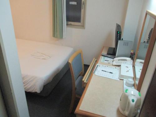 Katil atau katil-katil dalam bilik di Hotel Green Well
