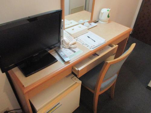 Televisyen dan/atau pusat hiburan di Hotel Green Well