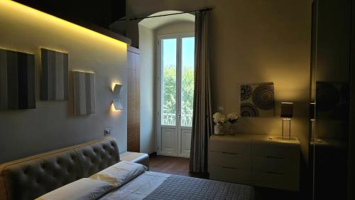 Postel nebo postele na pokoji v ubytování OroVerde Rooms & Suite nel cuore di Trani
