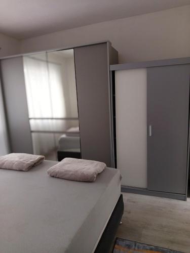 Katil atau katil-katil dalam bilik di Apartman ARIS