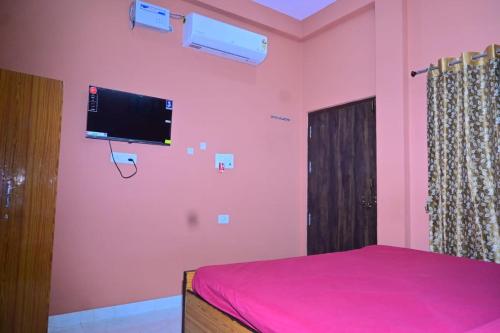 Μια τηλεόραση ή/και κέντρο ψυχαγωγίας στο Aagya Guest House