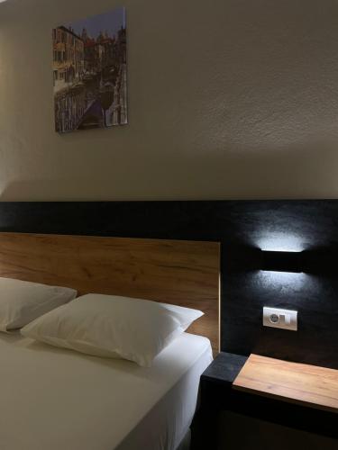 Llit o llits en una habitació de Vue Mer