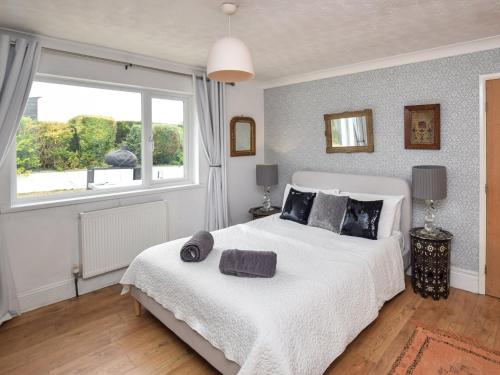 Ένα ή περισσότερα κρεβάτια σε δωμάτιο στο 6 Bed in Buckland Brewer SWOLD