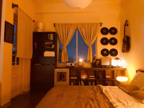 Una cama o camas en una habitación de Moodscape Homestay