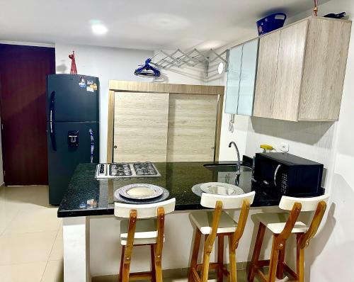 Dapur atau dapur kecil di Apartahotel CC San Gil Plaza
