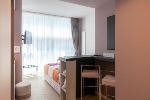 Ein Bett oder Betten in einem Zimmer der Unterkunft Boutique Casa Giulietta