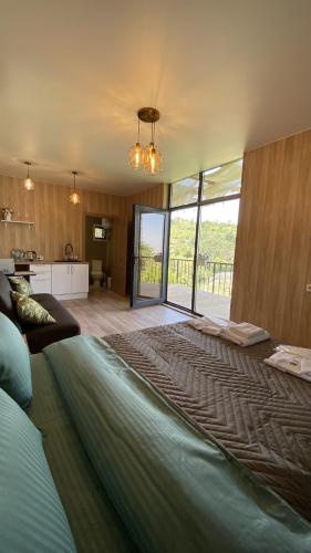 Postel nebo postele na pokoji v ubytování Darkhan Tau