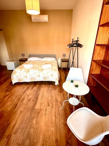 Katil atau katil-katil dalam bilik di Fine Flat La Rotonda B&B