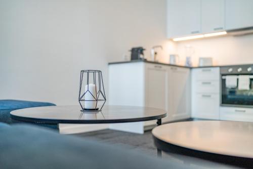 Whats-App Self-Check-IN - Deluxe Apartments Grazにあるキッチンまたは簡易キッチン