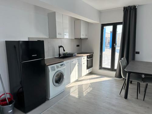 Η κουζίνα ή μικρή κουζίνα στο Sozopol Beach Apartments