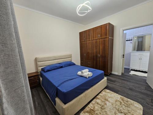 Postel nebo postele na pokoji v ubytování DION Apartment