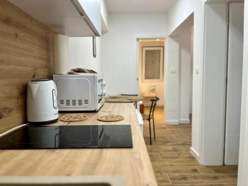 Η κουζίνα ή μικρή κουζίνα στο Crosshill apartments
