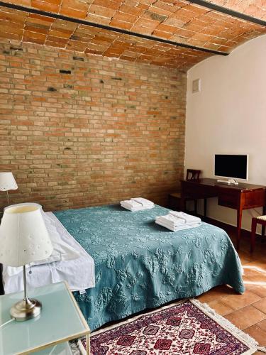 Postel nebo postele na pokoji v ubytování Agriturismo Sabidor