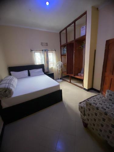 Katil atau katil-katil dalam bilik di Cozy Modern Apartment in Arusha
