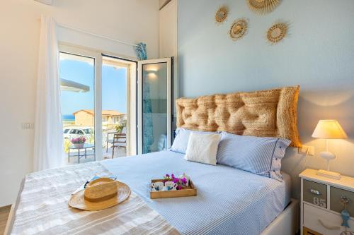 Una cama o camas en una habitación de Lovely Beach Suite