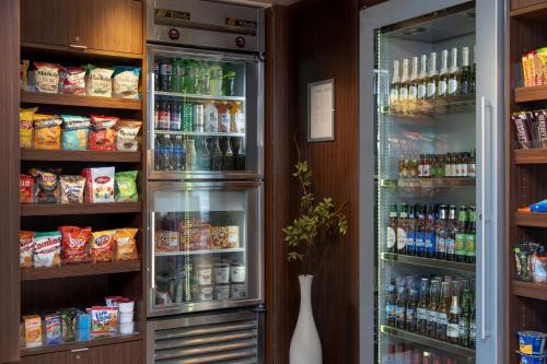 a refrigerator filled with lots of food and drinks at Fairfield Inn & Suites by Marriott Springfield Northampton/Amherst in Northampton