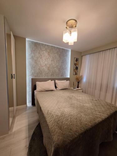 Postel nebo postele na pokoji v ubytování Cozy Nest