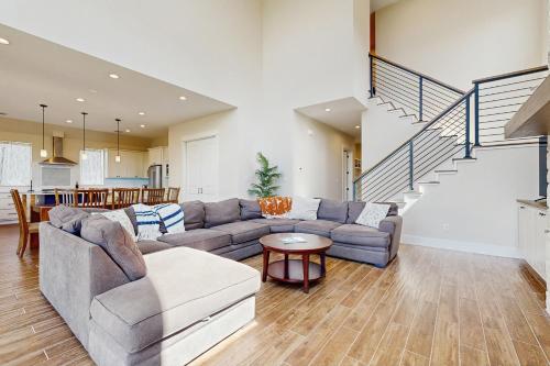 a living room with a couch and a table at Vacation Station in Canyon Lake
