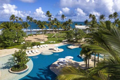 an aerial view of a resort with a swimming pool at Villa Teale Serene Dorado Escape in Dorado