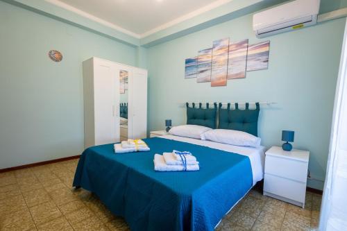 Ένα ή περισσότερα κρεβάτια σε δωμάτιο στο Sole e Luna Apartment